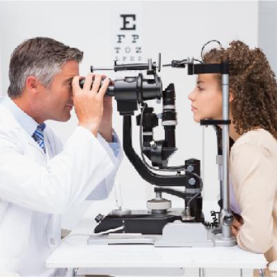 Woman getting an eye exam.