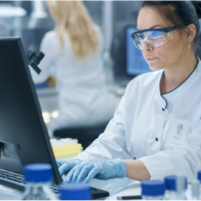 female scientist using computer