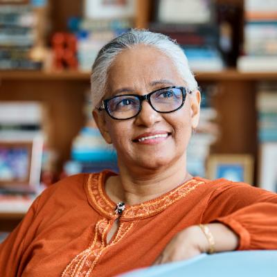 elderly Indian woman with glasses