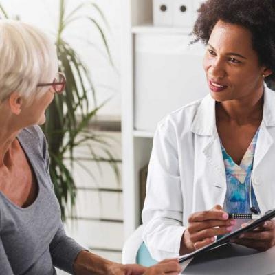 A doctor talks with a patient.