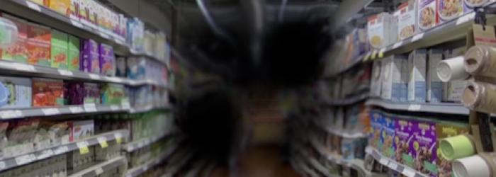 View of a grocery store aisle with AMD.