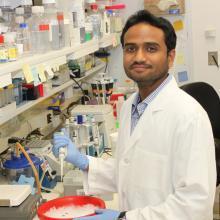 Picture of Aman George in the lab 