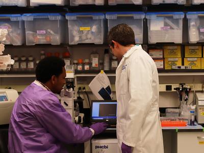Two men working in a lab