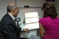 Girl and physician conducting CI exam