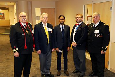 Photo of award check presenters and recipients