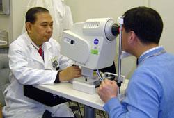 Doctor and patient at an eye clinic setting