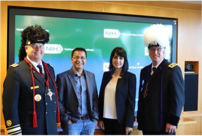 NEI scientists Mitra Farnoodian Tedrick and Kapil Bharti with KTEF Commanders