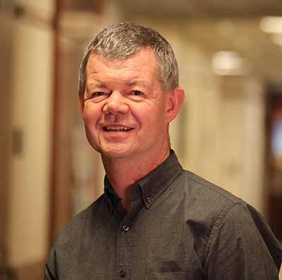 Photo shows T. Michael Redmond, Ph.D.