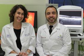 Dr. Rachel Bishop and Dr. Allen Eghrari, from the Johns Hopkins University Wilmer Eye Institute, shown here with the advanced imaging technologies being used for the PREVAIL III study in Monrovia, Liberia.