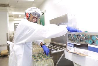 Butler working in the cage wash area.