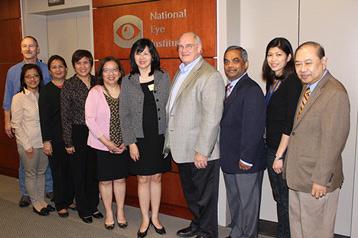 Leaders from the University of Philippines (UP) and Philippine NIH (PNIH) met with NEI staff in May 2015. From L to R: Dr. Fielding Hejtmancik; Dr. Marie Carmela M. Lapitan, director of research management and translation, PNIH; Dr. Arlene Samaniego, vice chancellor, UP; Dr. Eva Maria Cutiongco-de la Paz, vice chancellor for research and executive director, PNIH; Dr. Belinda Seto; Dr. Carmencita Padilla; Dr. Paul A. Sieving; Dr. Gyan Prakash, Dr. Patricia Cabrera; and Dr. Manuel Datiles.