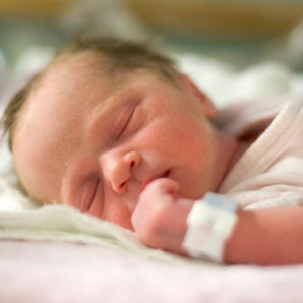 Small baby sleeping in hospital.