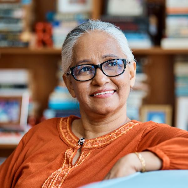 elderly Indian woman with glasses