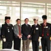 7 men look at the camera in a group portrait