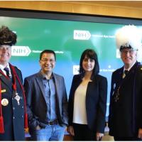 NEI scientists Mitra Farnoodian Tedrick and Kapil Bharti with KTEF Commanders