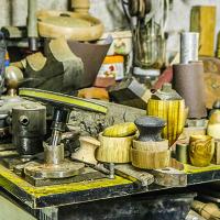 Many items on a workbench.