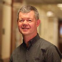 Photo shows T. Michael Redmond, Ph.D.