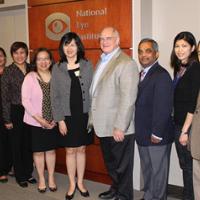 Leaders from the University of Philippines (UP) and Philippine NIH (PNIH) met with NEI staff in May 2015. From L to R: Dr. Fielding Hejtmancik; Dr. Marie Carmela M. Lapitan, director of research management and translation, PNIH; Dr. Arlene Samaniego, vice chancellor, UP; Dr. Eva Maria Cutiongco-de la Paz, vice chancellor for research and executive director, PNIH; Dr. Belinda Seto; Dr. Carmencita Padilla; Dr. Paul A. Sieving; Dr. Gyan Prakash, Dr. Patricia Cabrera; and Dr. Manuel Datiles.